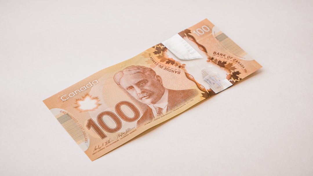 Canadian $100 polymer bill used for bank account deposits by international students in Canada