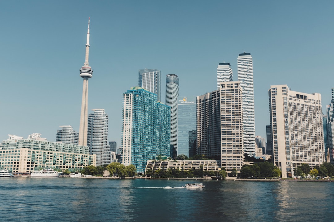 Toronto skyline with CN Tower and condo towers along the waterfront on a clear day